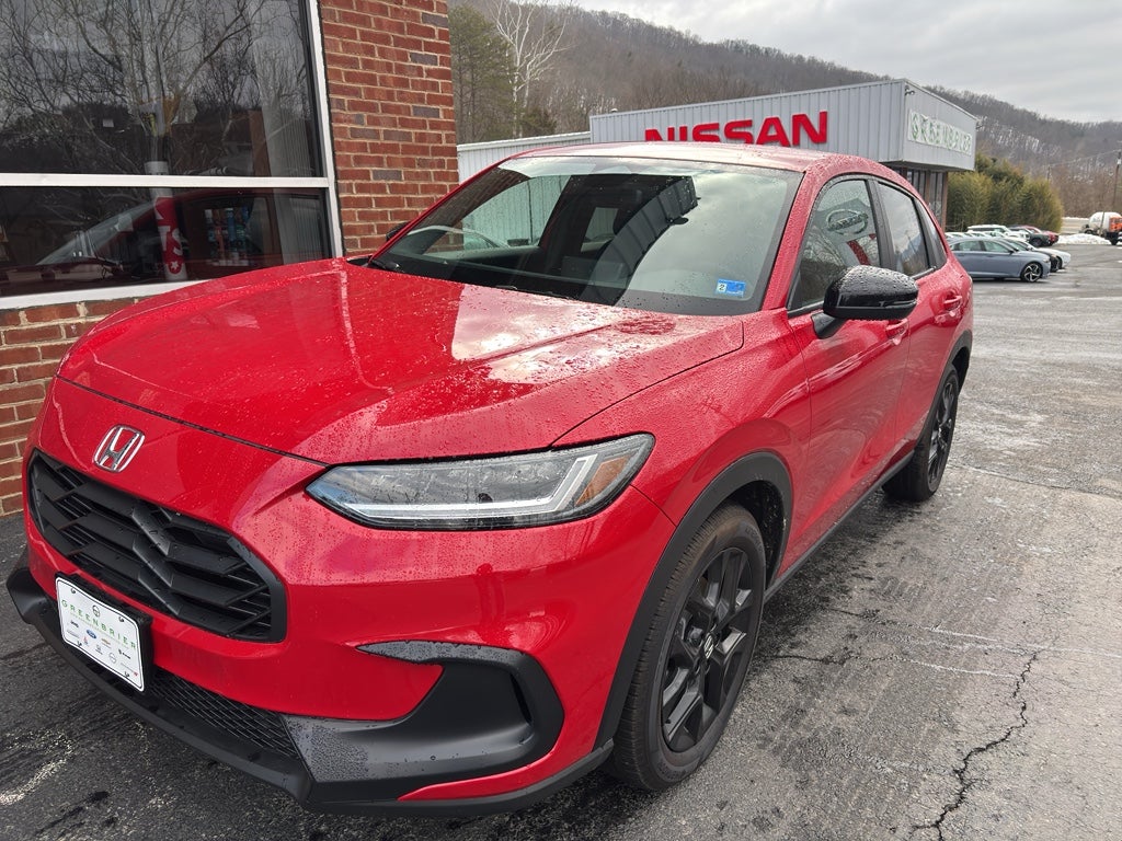 2025 Honda HR-V Sport in Milano Red — front three-quarter view